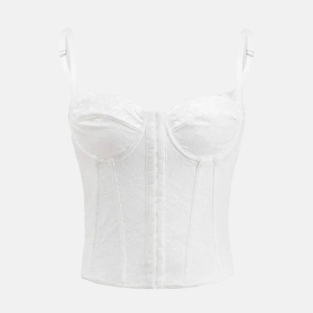 Corset Pink Lady com design clássico em renda, decote suave com suporte no busto, estrutura marcada e caimento cropped. Realça a cintura com elegância. Ideal para festas, baladas e jantares sofisticados.