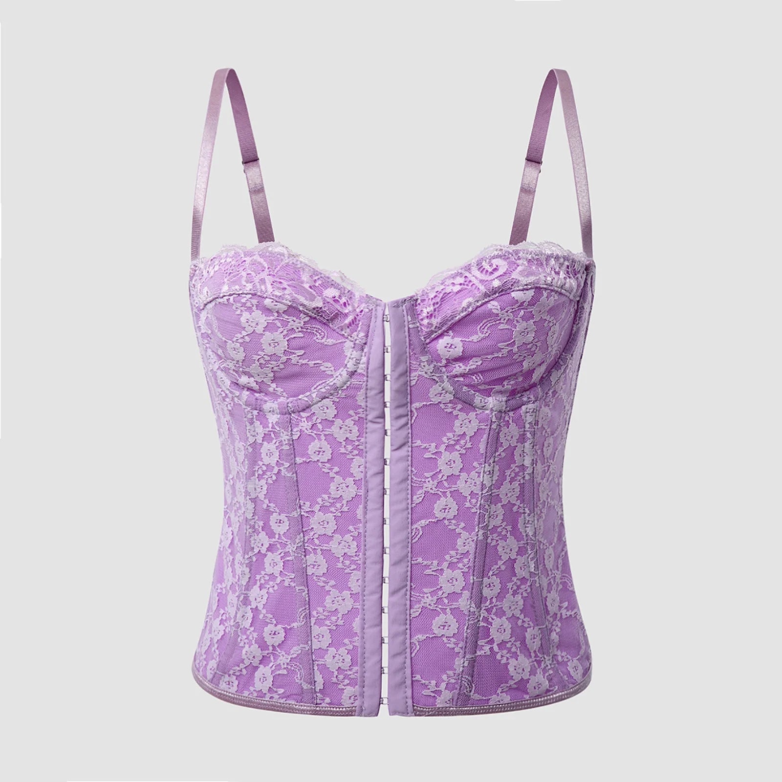 Corset Pink Lady com design clássico em renda, decote suave com suporte no busto, estrutura marcada e caimento cropped. Realça a cintura com elegância. Ideal para festas, baladas e jantares sofisticados.